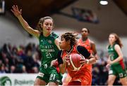 22 January 2023; Chanell Williams of Killester in action against Mireia Riera of Trinity Meteors during the Basketball Ireland Paudie O'Connor National Cup Final match between Trinity Meteors and Killester at National Basketball Arena in Tallaght, Dublin. Photo by Ben McShane/Sportsfile