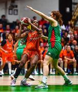 22 January 2023; Chyna Latimer of Killester in action against Claire Melia of Trinity Meteors during the Basketball Ireland Paudie O'Connor National Cup Final match between Trinity Meteors and Killester at National Basketball Arena in Tallaght, Dublin. Photo by Ben McShane/Sportsfile