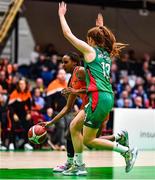 22 January 2023; Chyna Latimer of Killester in action against Claire Melia of Trinity Meteors during the Basketball Ireland Paudie O'Connor National Cup Final match between Trinity Meteors and Killester at National Basketball Arena in Tallaght, Dublin. Photo by Ben McShane/Sportsfile