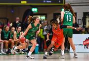 22 January 2023; Mireia Riera of Trinity Meteors in action against Chanell Williams of Killester during the Basketball Ireland Paudie O'Connor National Cup Final match between Trinity Meteors and Killester at National Basketball Arena in Tallaght, Dublin. Photo by Ben McShane/Sportsfile
