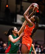 22 January 2023; Chyna Latimer of Killester in action against Sarah Kenny of Trinity Meteors during the Basketball Ireland Paudie O'Connor National Cup Final match between Trinity Meteors and Killester at National Basketball Arena in Tallaght, Dublin. Photo by Ben McShane/Sportsfile