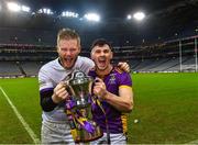 22 January 2023; Kilmacud Crokes players Conor Ferris, left, and Shane Walsh celebrate with the Andy Merrigan Cup after their side's victory in the AIB GAA Football All-Ireland Senior Club Championship Final match between Watty Graham's Glen of Derry and Kilmacud Crokes of Dublin at Croke Park in Dublin. Photo by Piaras Ó Mídheach/Sportsfile