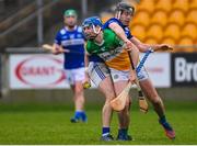 22 January 2023; Adrian Cleary of Offaly in action against Aidan Corby of Laois during the Walsh Cup Group 2 Round 3 match between Offaly and Laois at Glenisk O'Connor Park in Tullamore, Offaly. Photo by Tyler Miller/Sportsfile