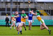 22 January 2023; Jack Kelly of Laois in action against Paddy Clancy of Offaly during the Walsh Cup Group 2 Round 3 match between Offaly and Laois at Glenisk O'Connor Park in Tullamore, Offaly. Photo by Tyler Miller/Sportsfile