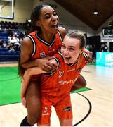 22 January 2023; Chyna Latimer, left, and Ella McCloskey of Killester celebrate after the Basketball Ireland Paudie O'Connor National Cup Final match between Trinity Meteors and Killester at National Basketball Arena in Tallaght, Dublin. Photo by Ben McShane/Sportsfile