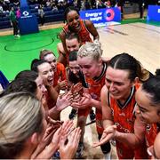 22 January 2023; Killester players celebrate after the Basketball Ireland Paudie O'Connor National Cup Final match between Trinity Meteors and Killester at National Basketball Arena in Tallaght, Dublin. Photo by Ben McShane/Sportsfile