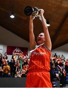 22 January 2023; Jenna Howe of Killester celebrate with the cup after the Basketball Ireland Paudie O'Connor National Cup Final match between Trinity Meteors and Killester at National Basketball Arena in Tallaght, Dublin. Photo by Ben McShane/Sportsfile