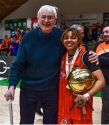 22 January 2023; MVP Chanell Williams of Killester with Killester founder Michael Casey the Basketball Ireland Paudie O'Connor National Cup Final match between Trinity Meteors and Killester at National Basketball Arena in Tallaght, Dublin. Photo by Ben McShane/Sportsfile