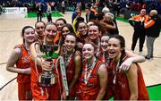 22 January 2023; Killester players pose with the cup after the Basketball Ireland Paudie O'Connor National Cup Final match between Trinity Meteors and Killester at National Basketball Arena in Tallaght, Dublin. Photo by Ben McShane/Sportsfile
