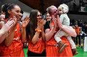 22 January 2023; Ieva Bagdanaviciene of Killester with her daughter Atene after the Basketball Ireland Paudie O'Connor National Cup Final match between Trinity Meteors and Killester at National Basketball Arena in Tallaght, Dublin. Photo by Ben McShane/Sportsfile