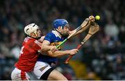 22 January 2023; John McGrath of Tipperary in action against Sean O'Leary Hayes of Cork during the Co-Op Superstores Munster Hurling League Final match between Cork and Tipperary at Páirc Ui Rinn in Cork. Photo by Seb Daly/Sportsfile