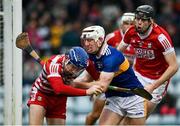 22 January 2023; Cork goalkeeper Patrick Collins in action against Sean Ryan of Tipperary during the Co-Op Superstores Munster Hurling League Final match between Cork and Tipperary at Páirc Ui Rinn in Cork. Photo by Seb Daly/Sportsfile