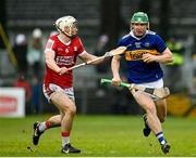 22 January 2023; Cian O'Dwyer of Tipperary in action against Tommy O'Connell of Cork during the Co-Op Superstores Munster Hurling League Final match between Cork and Tipperary at Páirc Ui Rinn in Cork. Photo by Seb Daly/Sportsfile