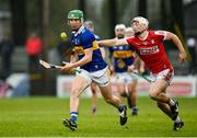 22 January 2023; Cian O'Dwyer of Tipperary in action against Tommy O'Connell of Cork during the Co-Op Superstores Munster Hurling League Final match between Cork and Tipperary at Páirc Ui Rinn in Cork. Photo by Seb Daly/Sportsfile