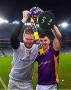 22 January 2023; Kilmacud Crokes players Conor Ferris, left, and Shane Walsh celebrate with the Andy Merrigan Cup after their side's victory in the AIB GAA Football All-Ireland Senior Club Championship Final match between Watty Graham's Glen of Derry and Kilmacud Crokes of Dublin at Croke Park in Dublin. Photo by Piaras Ó Mídheach/Sportsfile