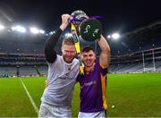 22 January 2023; Kilmacud Crokes players Conor Ferris, left, and Shane Walsh celebrate with the Andy Merrigan Cup after their side's victory in the AIB GAA Football All-Ireland Senior Club Championship Final match between Watty Graham's Glen of Derry and Kilmacud Crokes of Dublin at Croke Park in Dublin. Photo by Piaras Ó Mídheach/Sportsfile