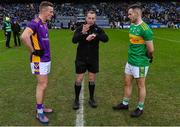 22 January 2023; Referee Derek O'Mahoney performs the coin toss with team captains Shane Cunningham of Kilmacud Crokes and Connor Carville of Watty Graham's Glen before the AIB GAA Football All-Ireland Senior Club Championship Final match between Watty Graham's Glen of Derry and Kilmacud Crokes of Dublin at Croke Park in Dublin. Photo by Piaras Ó Mídheach/Sportsfile