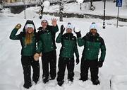 23 January 2023; Team Ireland, from left, coach Georgia Esposito, skier Ethan Bouchard, skier Eábha McKenna and alpine skiing coach Giorgio Marchesiniduring a team walk before the 2023 Winter European Youth Olympic Festival at Friuli-Venezia Giulia in Udine, Italy. Photo by Eóin Noonan/Sportsfile