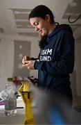 24 January 2023; Team Ireland alpine skier Eábha McKenna preparing her skis before the 2023 Winter European Youth Olympic Festival at Friuli-Venezia Giulia in Udine, Italy. Photo by Eóin Noonan/Sportsfile