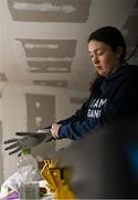 24 January 2023; Team Ireland alpine skier Eábha McKenna preparing her skis before the 2023 Winter European Youth Olympic Festival at Friuli-Venezia Giulia in Udine, Italy. Photo by Eóin Noonan/Sportsfile