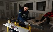 24 January 2023; Team Ireland alpine skier Eábha McKenna preparing her skis before the 2023 Winter European Youth Olympic Festival at Friuli-Venezia Giulia in Udine, Italy. Photo by Eóin Noonan/Sportsfile