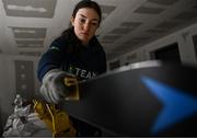 24 January 2023; Team Ireland alpine skier Eábha McKenna preparing her skis before the 2023 Winter European Youth Olympic Festival at Friuli-Venezia Giulia in Udine, Italy. Photo by Eóin Noonan/Sportsfile