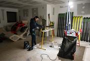 24 January 2023; Team Ireland alpine skier Eábha McKenna preparing her skis before the 2023 Winter European Youth Olympic Festival at Friuli-Venezia Giulia in Udine, Italy. Photo by Eóin Noonan/Sportsfile