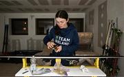 24 January 2023; Team Ireland alpine skier Eábha McKenna preparing her skis before the 2023 Winter European Youth Olympic Festival at Friuli-Venezia Giulia in Udine, Italy. Photo by Eóin Noonan/Sportsfile