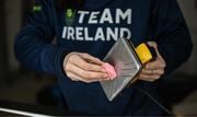 24 January 2023; Team Ireland alpine skier Eábha McKenna preparing her skis before the 2023 Winter European Youth Olympic Festival at Friuli-Venezia Giulia in Udine, Italy. Photo by Eóin Noonan/Sportsfile