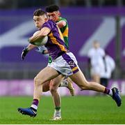 22 January 2023; Cian O'Connor of Kilmacud Crokes in action against Tiarnán Flannagan of Watty Graham's Glen during the AIB GAA Football All-Ireland Senior Club Championship Final match between Watty Graham's Glen of Derry and Kilmacud Crokes of Dublin at Croke Park in Dublin. Photo by Ramsey Cardy/Sportsfile