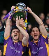 22 January 2023; Cillian O'Shea, left, and Andrew McGowan of Kilmacud Crokes lift the Andy Merrigan Cup after the AIB GAA Football All-Ireland Senior Club Championship Final match between Watty Graham's Glen of Derry and Kilmacud Crokes of Dublin at Croke Park in Dublin. Photo by Ramsey Cardy/Sportsfile