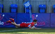 24 January 2023; Charlie O'Byrne of CUS scores a try during the Bank of Ireland Vinnie Murray Cup Semi-Final match between St Fintans High School and CUS at Energia Park in Dublin. Photo by Tyler Miller/Sportsfile