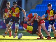 24 January 2023; Ponamu Palazzetti of St Fintans High School is tackled by Aidan Walsh of CUS during the Bank of Ireland Vinnie Murray Cup Semi-Final match between St Fintans High School and CUS at Energia Park in Dublin. Photo by Tyler Miller/Sportsfile