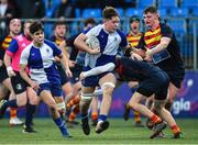 24 January 2023; Adam Tobin of St Andrew's College is tackled by Matthew Stewart of Temple Carrig during the Bank of Ireland Vinnie Murray Cup Semi-Final match between Temple Carrig and St Andrews College at Energia Park in Dublin. Photo by Tyler Miller/Sportsfile