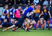 24 January 2023; Adam Tobin of St Andrew's College is tackled by Darragh Shanahan of Temple Carrig during the Bank of Ireland Vinnie Murray Cup Semi-Final match between Temple Carrig and St Andrews College at Energia Park in Dublin. Photo by Tyler Miller/Sportsfile