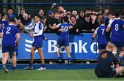 24 January 2023; Francis Manzocchi of St Andrew's College celebrates with supporters after his side's victory in the Bank of Ireland Vinnie Murray Cup Semi-Final match between Temple Carrig and St Andrews College at Energia Park in Dublin. Photo by Tyler Miller/Sportsfile