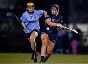 24 January 2023; Caroline Kennedy of SETU Waterford in action against Caoimhe Collins of UCD during the Ashbourne Cup Round 2 match between UCD and South East Technological University Waterford at Billings Park, UCD in Dublin. Photo by Sam Barnes/Sportsfile