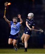 24 January 2023; Carlise Comerford of SETU Waterford in action against Aedin Slattery of UCD during the Ashbourne Cup Round 2 match between UCD and South East Technological University Waterford at Billings Park, UCD in Dublin. Photo by Sam Barnes/Sportsfile