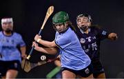 24 January 2023; Kate Kirwan of UCD in action against Niamh Crowley of SETU Waterford during the Ashbourne Cup Round 2 match between UCD and South East Technological University Waterford at Billings Park, UCD in Dublin. Photo by Sam Barnes/Sportsfile