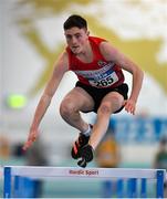 21 January 2023; Daniel Downey of Portlaoise AC, Laois, competes in the 60m hurdles event of the juvenile pentathlon during day one of the 123.ie National Indoor Combined Events at the TUS International arena in Athlone, Westmeath. Photo by Sam Barnes/Sportsfile