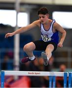 21 January 2023; Seán O'Sullivan of Ratoath AC, Meath, competes in the 60m hurdles event of the juvenile pentathlon during day one of the 123.ie National Indoor Combined Events at the TUS International arena in Athlone, Westmeath. Photo by Sam Barnes/Sportsfile