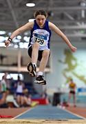 21 January 2023; Ava Lewis of Lusk AC, Dublin, competes in the long jump event of the juvenile pentathlon during day one of the 123.ie National Indoor Combined Events at the TUS International arena in Athlone, Westmeath. Photo by Sam Barnes/Sportsfile