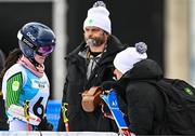 26 January 2023; Eábha McKenna of Ireland is interviewed by Social Media and Communications Executive Kieran Jackson after competing in the girls giant slalom event during day three of the 2023 Winter European Youth Olympic Festival at Friuli-Venezia Giulia in Udine, Italy. Photo by Eóin Noonan/Sportsfile