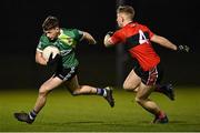 25 January 2023; Padraig Purcell of Queen's University Belfast in action against Damien Bourke of UCC during the HE GAA Sigerson Cup Round 3 match between University College Cork and Queen's University Belfast at the GAA National Games Development Centre in Abbotstown, Dublin. Photo by Piaras Ó Mídheach/Sportsfile