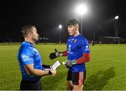 25 January 2023; Referee David Gough in conversation with UCC goalkeeper Dylan Foley before the HE GAA Sigerson Cup Round 3 match between University College Cork and Queen's University Belfast at the GAA National Games Development Centre in Abbotstown, Dublin. Photo by Piaras Ó Mídheach/Sportsfile