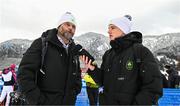 26 January 2023; Team Ireland alpine skiing coach Giorgio Marchesini speaking to Social Media and Communications Executive Kieran Jackson after the girls giant slalom event during day three of the 2023 Winter European Youth Olympic Festival at Friuli-Venezia Giulia in Udine, Italy. Photo by Eóin Noonan/Sportsfile