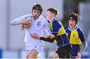 26 January 2023; Rory Wrafter of Presentation College Bray is tackled by Darragh Culligan of CBS Naas during the Bank of Ireland Fr Godfrey Cup Semi-Final match between CBS Naas and Presentation College Bray at Energia Park in Dublin. Photo by Ben McShane/Sportsfile