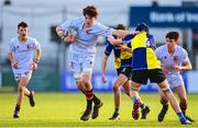 26 January 2023; Alex O'Dowd of Presentation College Bray in action against Adain Tamming of CBS Naas during the Bank of Ireland Fr Godfrey Cup Semi-Final match between CBS Naas and Presentation College Bray at Energia Park in Dublin. Photo by Ben McShane/Sportsfile