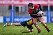 26 January 2023; Corey O'Brien of Temple Carrig is tackled by Fionn MacDonald of St Fintans High School during the Bank of Ireland Fr Godfrey Cup Semi-Final match between St Fintans High School and Temple Carrig at Energia Park in Dublin. Photo by Ben McShane/Sportsfile