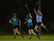 26 January 2023; Éoghan Geraghty of UCD has his pass blocked by Conor Drennan of Maynooth University during the HE GAA Fitzgibbon Cup Round 2 match between Maynooth University and University College Dublin at the Maynooth University North Campus in Kildare. Photo by Tyler Miller/Sportsfile